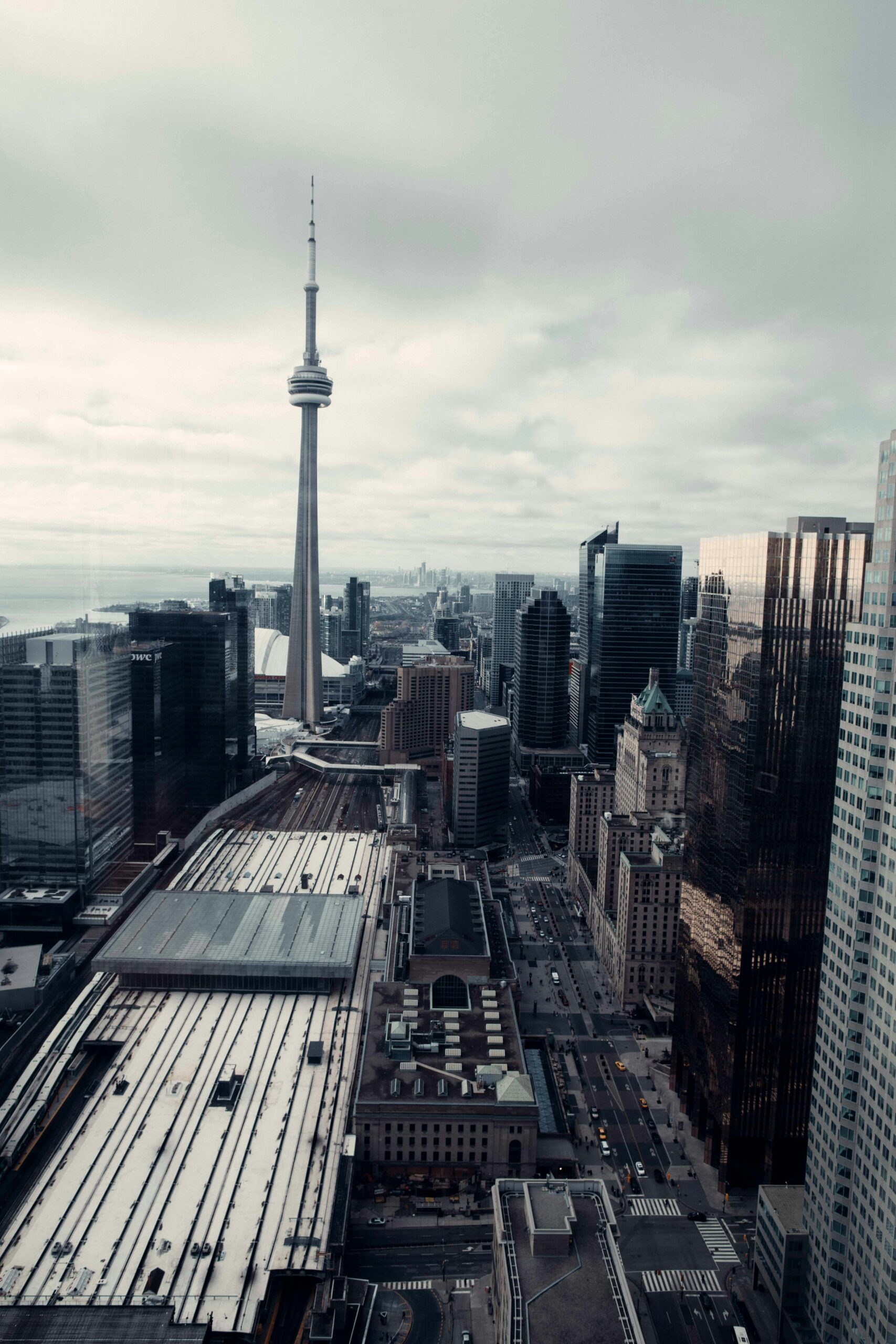 A breathtaking aerial view of Toronto's skyline with the iconic CN Tower, capturing urban architecture.